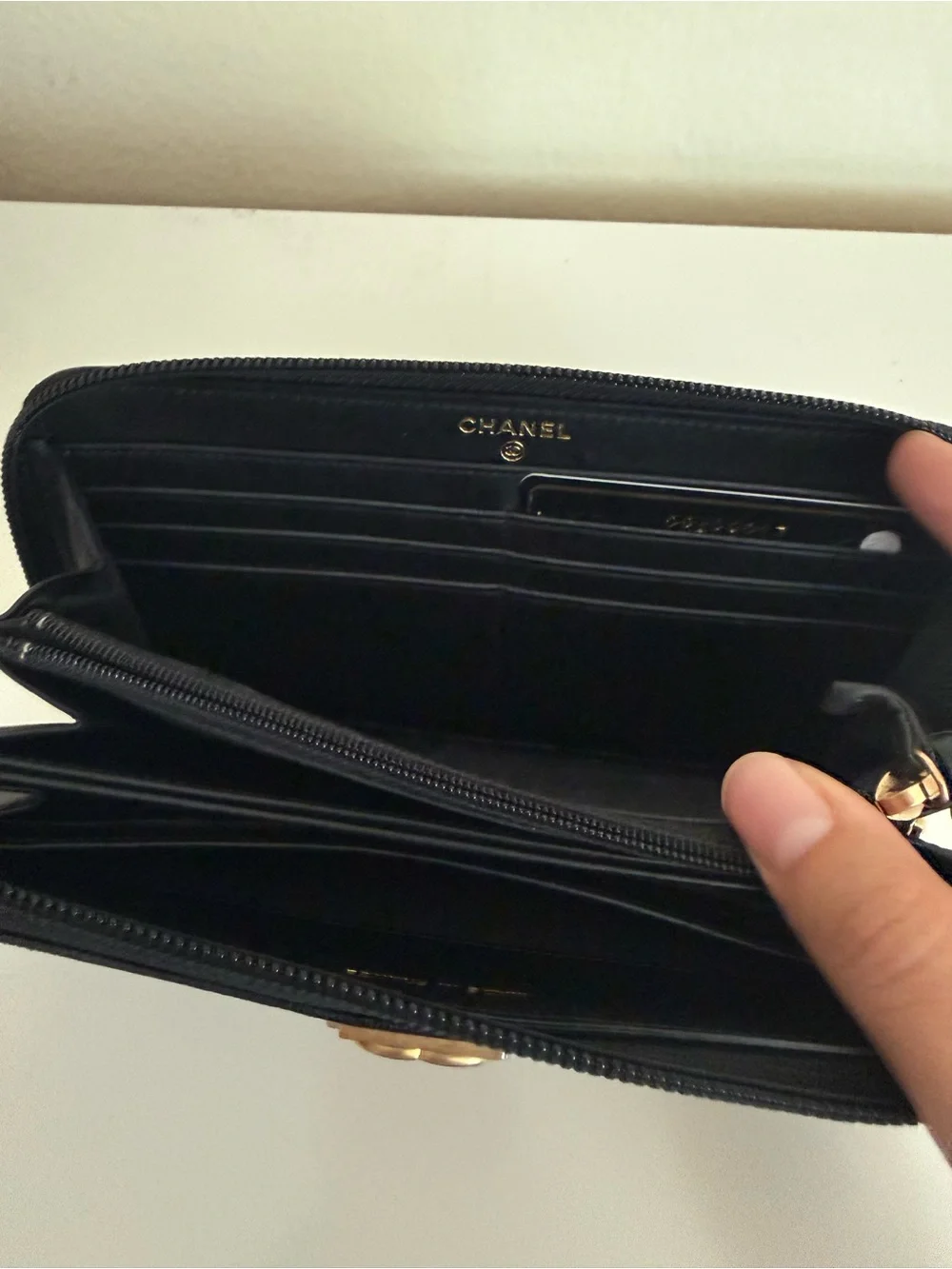 CHANEL Black Quilted Zip-Around Wallet with Gold CC Lock